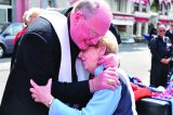 2011 Lourdes Pilgrimage - Archbishop Dolan with Malades (126/267)